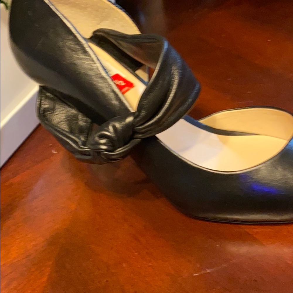 Black heels put a 2 inch here